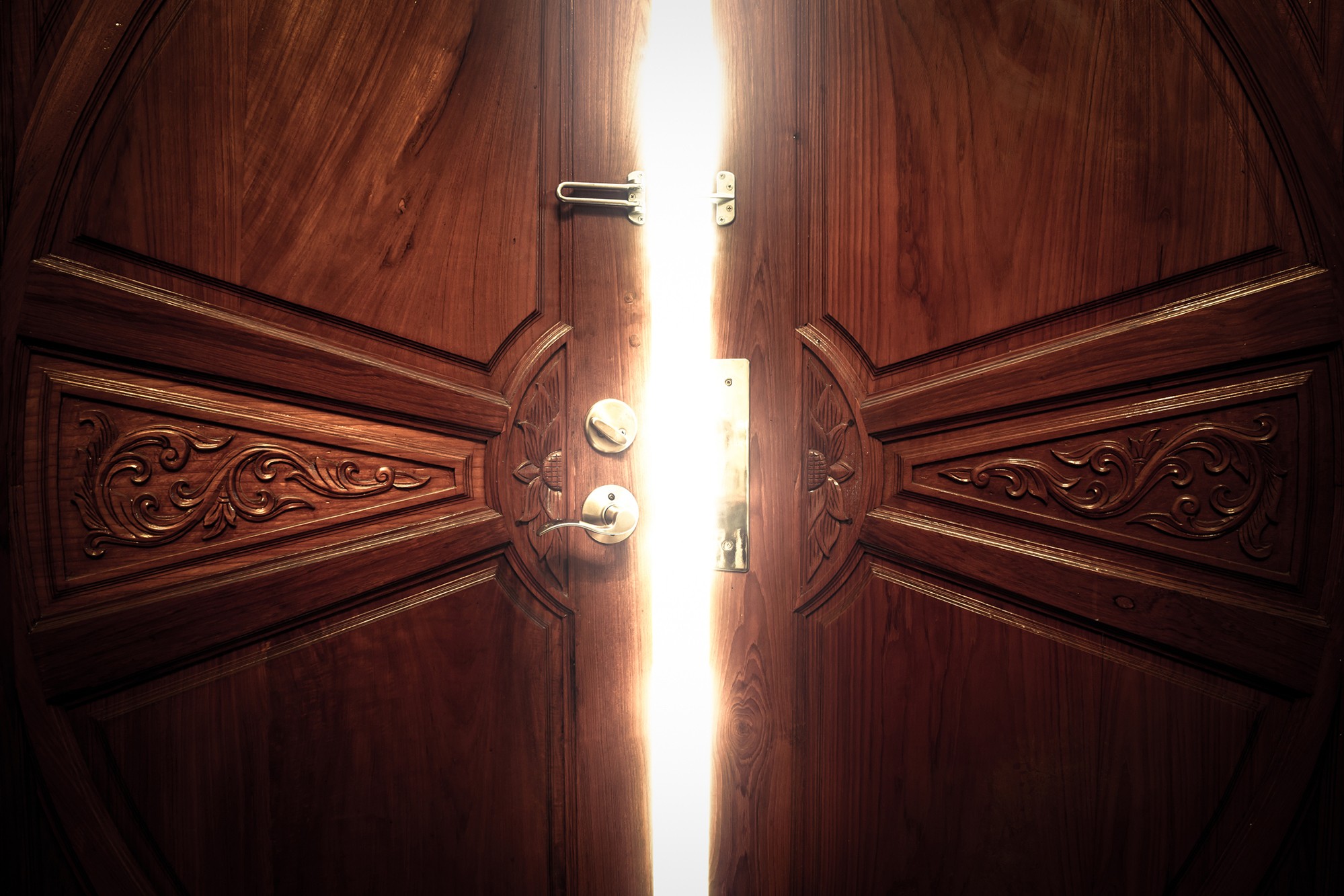 Wooden door slightly ajar